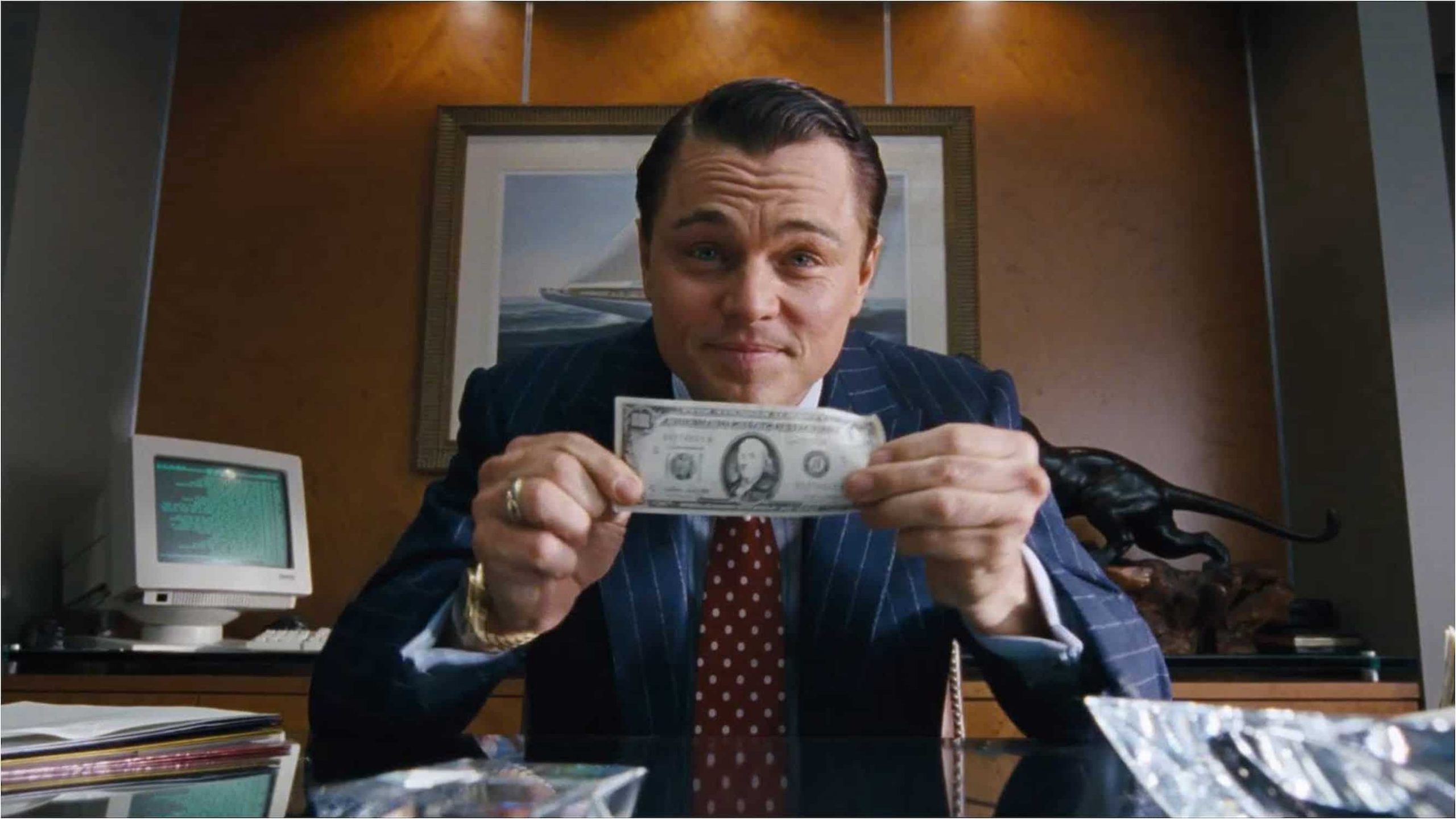 Leonardo DiCaprio interpretando Jordan Belfort em O Lobo de Wall Street. Foto/Reprodução.