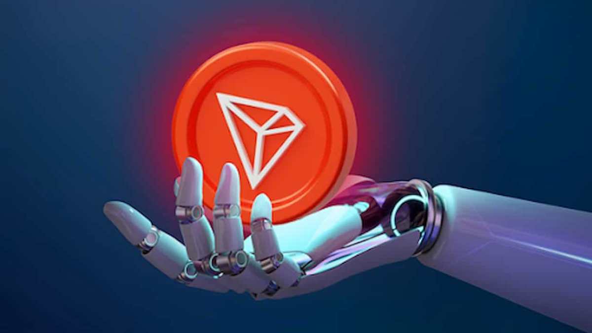Moeda tron na mão de um rôbo
